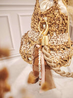 Sac seau au crochet ajouré marron et doré – modèle Nantosuelta - Sacs au crochet - Irilena